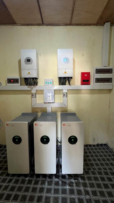 Lithium battery towers and hybrid inverters mounted in an equipment room